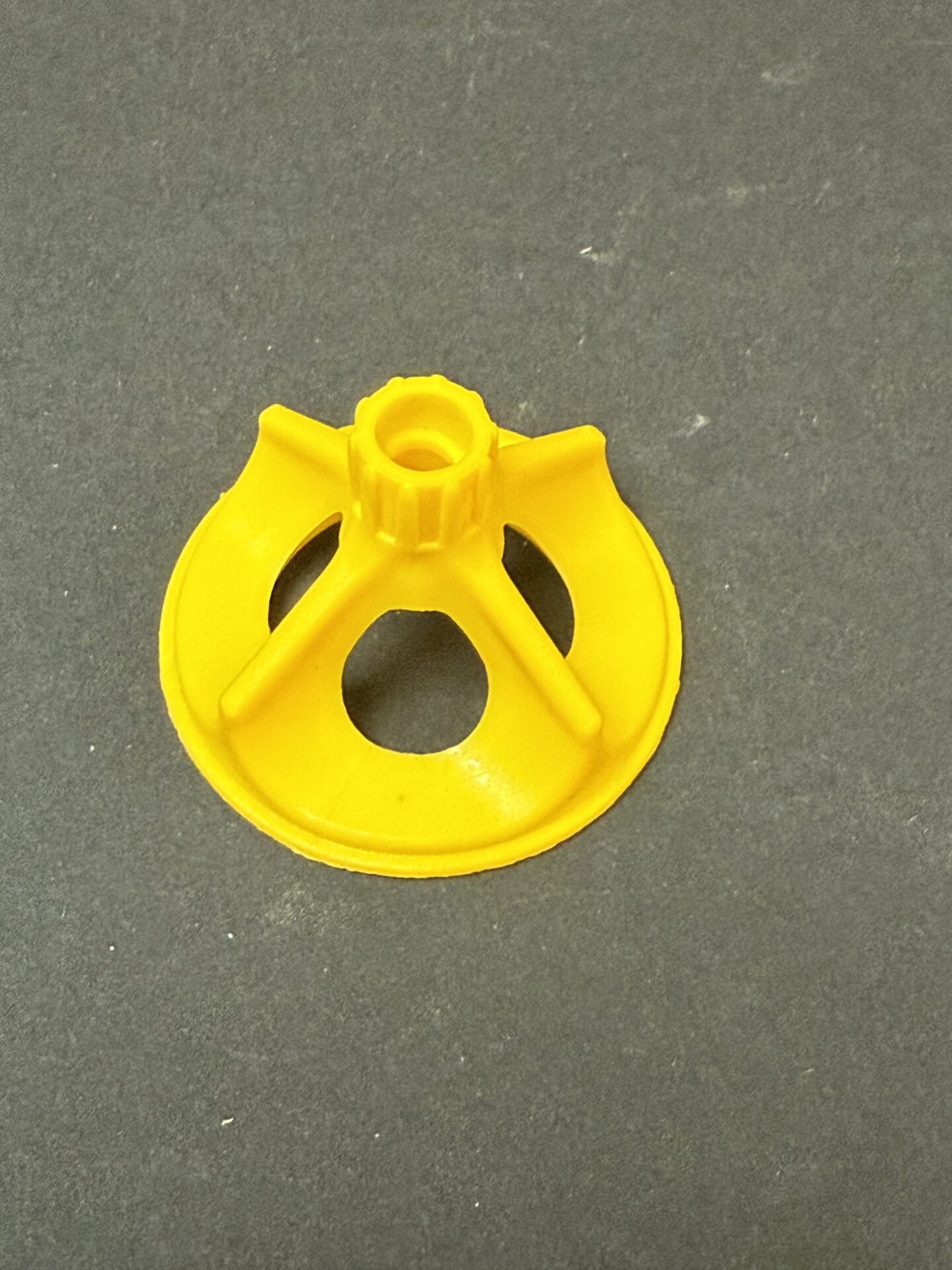 Single yellow TileFixer Torque Levelling cap